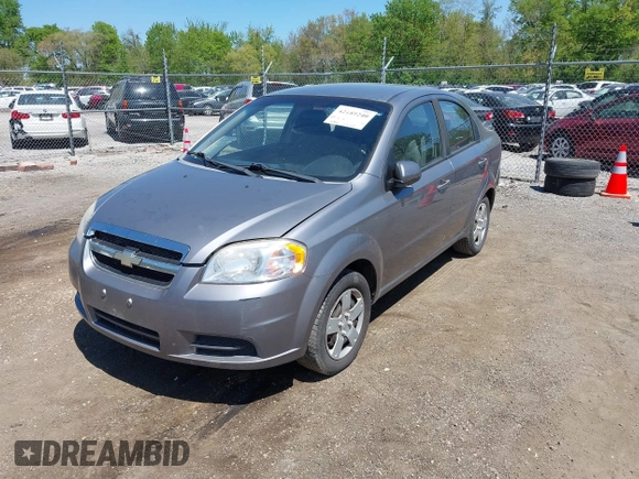 2011 Chevrolet Aveo 1LT with VIN KL1TD5DE2BB166314, listed as a IAAI auction lot 42189240 with 140,922 mi miles and . Bid and sale history available at DreamBid. Image 2.