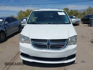 2014 Dodge Grand Caravan SXT with VIN 2C4RDGCG1ER429495, listed as a IAAI auction lot 42058513 with 136,936 mi miles and . Bid and sale history available at DreamBid. Image 12.