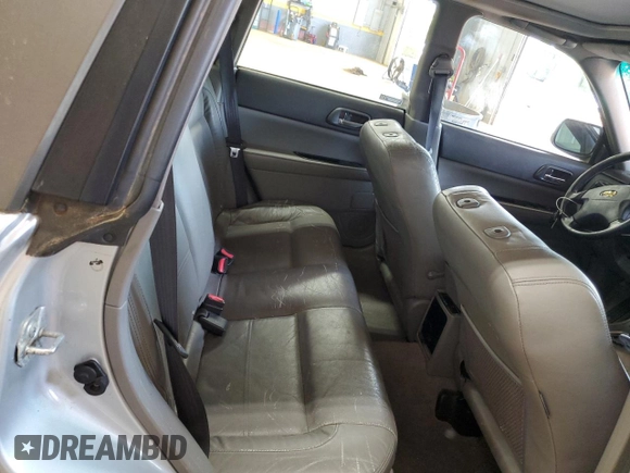 2004 Subaru Forester XS z VIN JF1SG65614H757524, wystawiony jako Copart lot #57094535 z przebiegiem 184 864 mil mil oraz Szkoda całkowita • Salvage title. Historia ofert i sprzedaży dostępna na DreamBid. Obrazek 11.