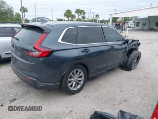 2024 Honda CR-V EX-L with VIN 2HKRS3H76RH300811, listed as a IAAI auction lot 40879908 with 26,586 mi miles and . Bid and sale history available at DreamBid. Image 4.