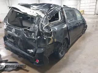 2011 Toyota Sienna SE with VIN 5TDXK3DC1BS172813, listed as a IAAI auction lot 41643352 with 172,385 mi miles. Bid and sale history available at carsss.com. Image 4.