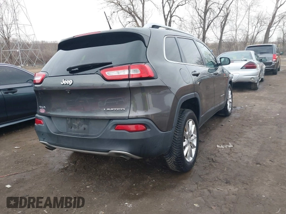 2014 Jeep Cherokee Limited with VIN 1C4PJMDS3EW137985, listed as a IAAI auction lot 41543651 with 131,312 mi miles. Bid and sale history available at carsss.com. Image 4.
