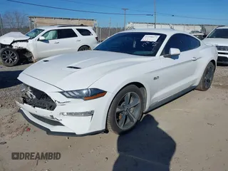2018 Ford Mustang GT with VIN 1FA6P8CF2J5178801, listed as a IAAI auction lot 41198673 with 99,684 mi miles and . Bid and sale history available at DreamBid. Image 2.
