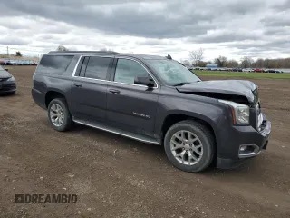 2016 GMC Yukon XL SLT with VIN 1GKS2GKC3GR282521, listed as a Copart auction lot 53453175 with 102,250 mi miles and Salvage Title. Bid and sale history available at carsss.com. Image 4.