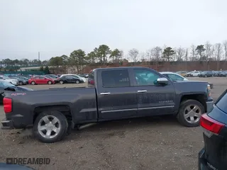 2014 Chevrolet Silverado 1500 LTZ with VIN 3GCUKSEC4EG384636, listed as a IAAI auction lot 41352484 with 153,976 mi miles. Bid and sale history available at carsss.com. Image 13.