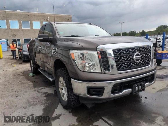 2017 Nissan Titan S z VIN 1N6AA1CJ2HN553031, wystawiony jako Copart lot #59764065 z przebiegiem 148 012 mil mil oraz Szkoda całkowita • Salvage title. Historia ofert i sprzedaży dostępna na DreamBid. Obrazek 13.