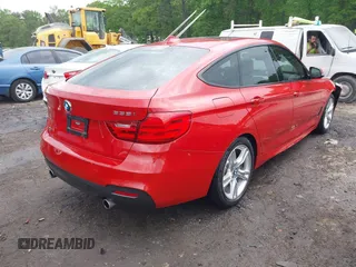 2014 BMW 3 Series GT 335i Gran Turismo xDrive with VIN WBA3X9C52ED152721, listed as a IAAI auction lot 42079523 with 92,233 mi miles and . Bid and sale history available at DreamBid. Image 4.