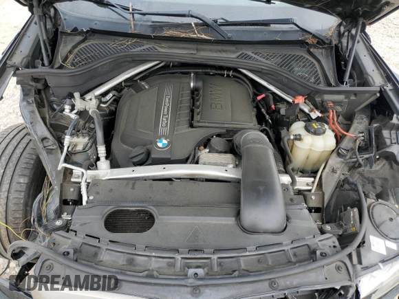 2017 BMW X6 sDrive35i z VIN 5UXKU0C33H0G57469, wystawiony jako Copart lot #51586025 z przebiegiem 74 070 mil mil oraz Szkoda całkowita • Salvage title. Historia ofert i sprzedaży dostępna na DreamBid. Obrazek 12.