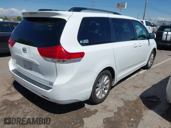 2011 Toyota Sienna XLE with VIN 5TDDK3DCXBS029961, listed as a IAAI auction lot 42228356 with 251,571 mi miles and . Bid and sale history available at DreamBid. Image 4.