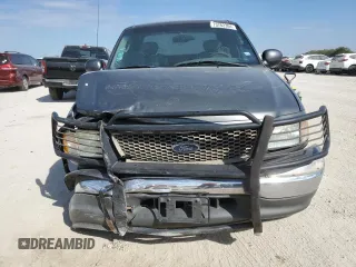 2003 Ford F-150 XL with VIN 1FTRX17L33NB34789, listed as a Copart auction lot 73762304 with 0 mi miles and Salvage Title. Bid and sale history available at carsss.com. Image 5.