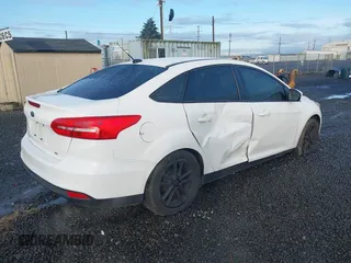 2018 Ford Focus SE with VIN 1FADP3F23JL242066, listed as a IAAI auction lot 41804512 with 99,662 mi miles. Bid and sale history available at carsss.com. Image 4.