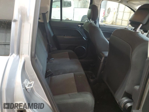 2016 Jeep Compass Sport z VIN 1C4NJCBA9GD810594, wystawiony jako Copart lot #56961885 z przebiegiem 151 386 mil mil oraz Szkoda całkowita • Salvage title. Historia ofert i sprzedaży dostępna na DreamBid. Obrazek 11.