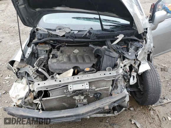 2010 Nissan Versa S z VIN 3N1BC1AP9AL418100, wystawiony jako Copart lot #57971985 z przebiegiem 95 353 mil mil oraz Szkoda całkowita • Salvage title. Historia ofert i sprzedaży dostępna na DreamBid. Obrazek 11.