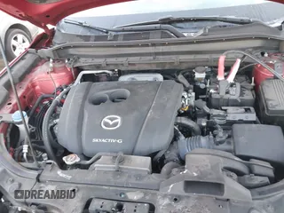 2020 Mazda CX-5 Touring z VIN JM3KFACM1L0855474, wystawiony jako IAAI lot #42004504 z przebiegiem 82 505 mil mil oraz . Historia ofert i sprzedaży dostępna na DreamBid. Obrazek 10.