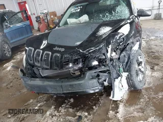 2018 Jeep Cherokee Trailhawk z VIN 1C4PJMBB8JD567438, wystawiony jako IAAI lot #41620927 z przebiegiem 109 041 mil mil oraz . Historia ofert i sprzedaży dostępna na DreamBid. Obrazek 12.