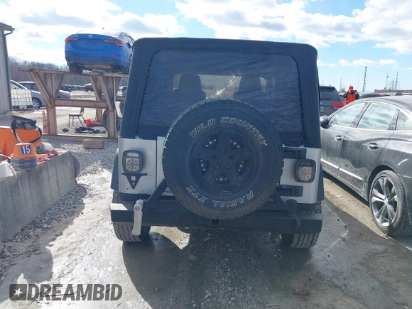 2005 Jeep Wrangler Unlimited with VIN 1J4FA44S25P340852, listed as a IAAI auction lot 41441671 with 139,302 mi miles. Bid and sale history available at carsss.com. Image 16.