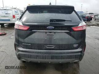 2020 Ford Edge SEL z VIN 2FMPK4J93LBB36067, wystawiony jako Copart lot #49913935 z przebiegiem 83 557 mil mil oraz Czysty tytuł • Clean title. Historia ofert i sprzedaży dostępna na DreamBid. Obrazek 6.