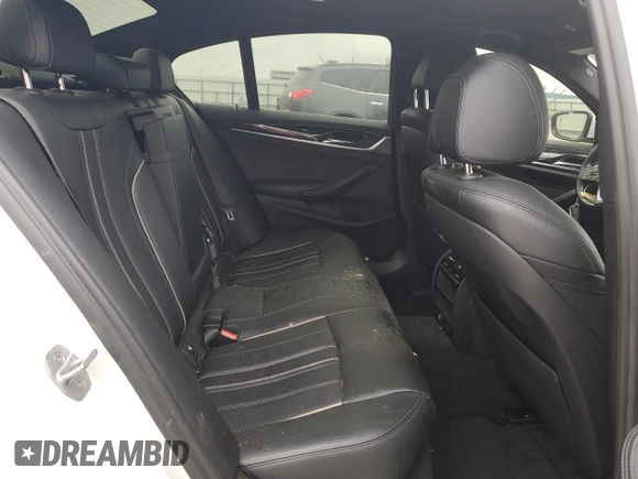 2017 BMW 5 Series 530i z VIN WBAJA5C37HG896060, wystawiony jako Copart lot #52409635 z przebiegiem 97 686 mil mil oraz Szkoda całkowita • Salvage title. Historia ofert i sprzedaży dostępna na DreamBid. Obrazek 10.