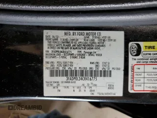 2012 Ford Fusion Hybrid с VIN 3FADP0L34CR416775, выставлен на аукционе Copart как лот 55108645 с пробегом 102 574 миль миль и Списание • Salvage title. История ставок и продаж доступна на DreamBid. Изображение 12.