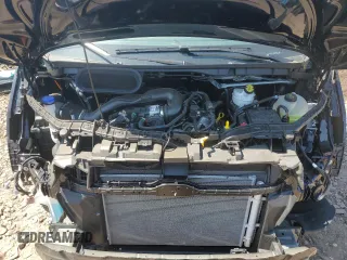 2024 Ford Transit Cargo z VIN 1FTBW3X81RKB79008, wystawiony jako Copart lot #58158005 z przebiegiem Nie podano mil oraz Szkoda całkowita • Salvage title. Historia ofert i sprzedaży dostępna na DreamBid. Obrazek 12.