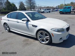 2013 BMW M5 with VIN WBSFV9C58DC773268, listed as a IAAI auction lot 41890830 with 128,399 mi miles. Bid and sale history available at carsss.com. Image 13.