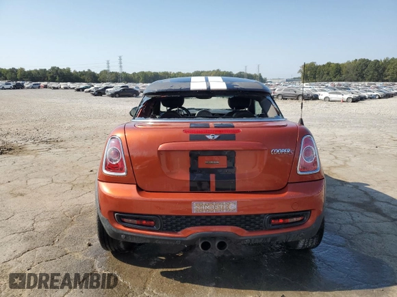 2013 MINI Coupe S with VIN WMWSX3C58DT466788, listed as a Copart auction lot 75541314 with 101,890 mi miles and Salvage Title. Bid and sale history available at DreamBid. Image 6.