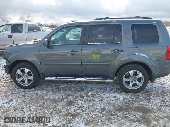 2012 Honda Pilot EX-L with VIN 5FNYF4H52CB013539, listed as a IAAI auction lot 40987268 with 93,022 mi miles and . Bid and sale history available at DreamBid. Image 14.