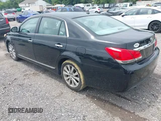 2012 Toyota Avalon with VIN 4T1BK3DB9CU466888, listed as a IAAI auction lot 42712681 with 323,252 mi miles and . Bid and sale history available at DreamBid. Image 3.