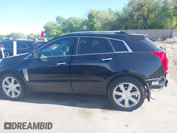 2015 Cadillac SRX Premium Collection with VIN 3GYFNGE3XFS554620, listed as a IAAI auction lot 42308670 with 95,063 mi miles and . Bid and sale history available at DreamBid. Image 14.