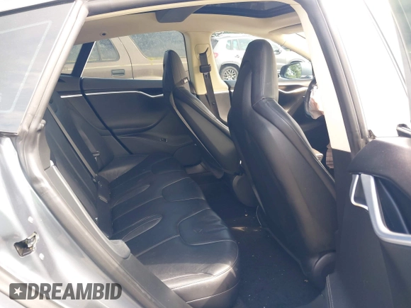 2014 Tesla Model S 60 with VIN 5YJSA1H18EFP38078, listed as a IAAI auction lot 42748619 with 159,285 mi miles and . Bid and sale history available at DreamBid. Image 8.