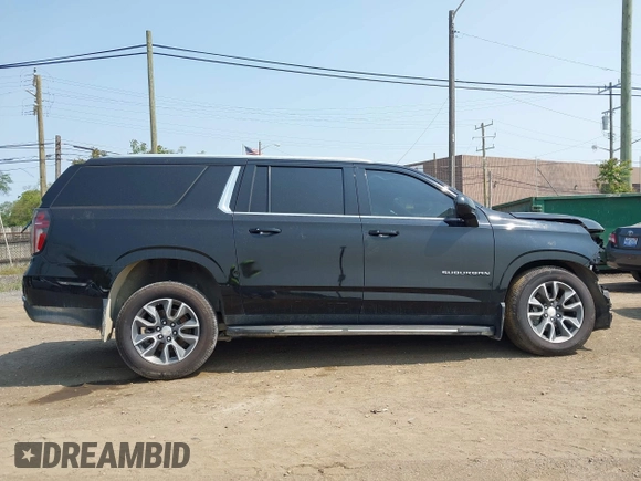 2021 Chevrolet Suburban LS z VIN 1GNSKBKD5MR303640, wystawiony jako IAAI lot #42359585 z przebiegiem Nie podano mil oraz . Historia ofert i sprzedaży dostępna na DreamBid. Obrazek 12.