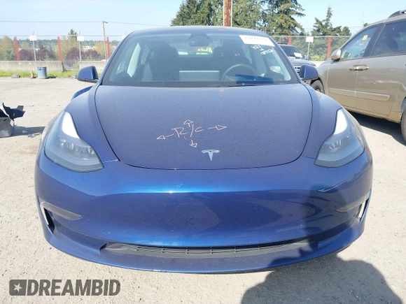 2023 Tesla Model 3 Performance with VIN 5YJ3E1EC2PF679613, listed as a IAAI auction lot 42099199 with 21,721 mi miles. Bid and sale history available at carsss.com. Image 13.