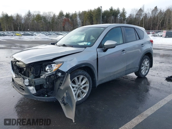 2014 Mazda CX-5 Grand Touring with VIN JM3KE2DY8E0304911, listed as a IAAI auction lot 41672197 with 77,523 mi miles. Bid and sale history available at carsss.com. Image 17.