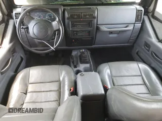 1997 Jeep Wrangler SE with VIN 1J4FY29P2VP431639, listed as a Copart auction lot 61222754 with 225,081 mi miles and Salvage Title. Bid and sale history available at carsss.com. Image 8.