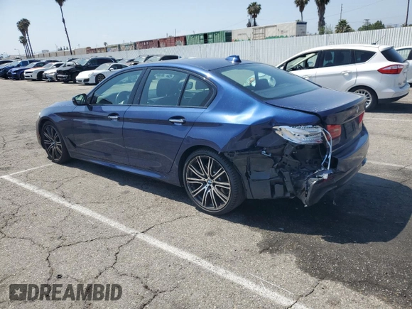 2018 BMW 5 Series 540i with VIN WBAJE5C51JWA94673, listed as a Copart auction lot 59807825 with 77,051 mi miles and Salvage title. Bid and sale history available at DreamBid. Image 2.