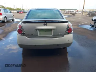 2006 Nissan Altima 2.5 S with VIN 1N4AL11EX6N303185, listed as a IAAI auction lot 41423674 with 240,388 mi miles. Bid and sale history available at carsss.com. Image 16.