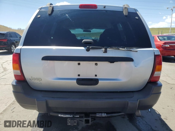 2004 Jeep Grand Cherokee Laredo with VIN 1J4GW48S34C430923, listed as a Copart auction lot 53742105 with 194,372 mi miles and Salvage Title. Bid and sale history available at carsss.com. Image 6.