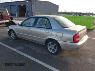 2003 Mazda Protege DX with VIN JM1BJ225X31160766, listed as a IAAI auction lot 41941361 with 190,125 mi miles and . Bid and sale history available at DreamBid. Image 3.