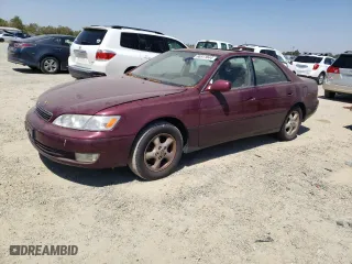 1997 Lexus ES 300 Luxury Sport Sdn with VIN JT8BF22G0V0030408, listed as a Copart auction lot 66811844 with 185,314 mi miles and Salvage Title. Bid and sale history available at carsss.com. Image 1.
