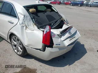 2013 Cadillac ATS Premium z VIN 1G6AE5S35D0129175, wystawiony jako IAAI lot #42037872 z przebiegiem 95 747 mil mil oraz . Historia ofert i sprzedaży dostępna na DreamBid. Obrazek 6.
