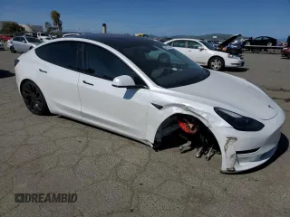 2021 Tesla Model 3 Performance with VIN 5YJ3E1EC5MF077493, listed as a Copart auction lot 48067045 with 44,285 mi miles and Salvage Title. Bid and sale history available at DreamBid. Image 4.