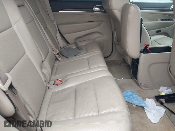 2015 Jeep Grand Cherokee Overland with VIN 1C4RJECG1FC769950, listed as a IAAI auction lot 42405712 with 217,514 mi miles and . Bid and sale history available at DreamBid. Image 8.
