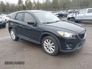 2013 Mazda CX-5 Grand Touring with VIN JM3KE2DEXD0124270, listed as a IAAI auction lot 41942120 with 109,087 mi miles. Bid and sale history available at carsss.com. Image 1.
