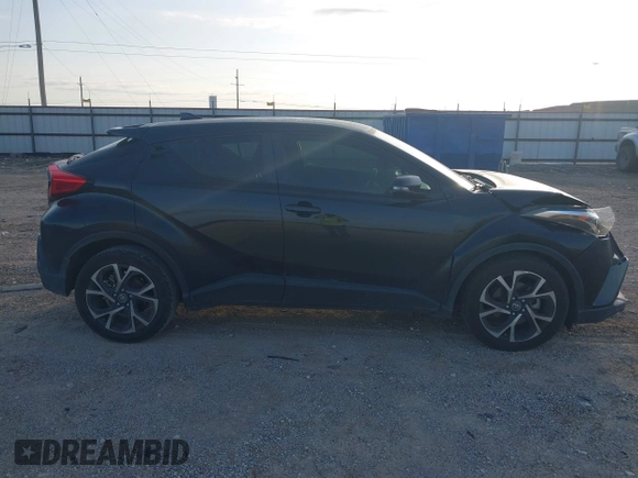 2018 Toyota C-HR XLE with VIN JTNKHMBX6J1007058, listed as a IAAI auction lot 42100587 with 71,725 mi miles and . Bid and sale history available at DreamBid. Image 14.