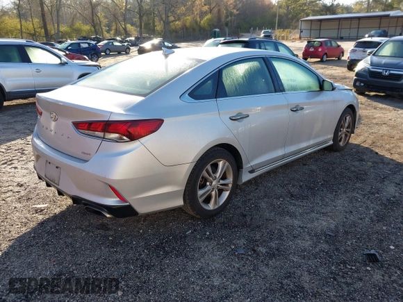 2018 Hyundai Sonata SEL z VIN 5NPE34AF0JH599137, wystawiony jako IAAI lot #41865261 z przebiegiem 63 719 mil mil oraz . Historia ofert i sprzedaży dostępna na DreamBid. Obrazek 4.