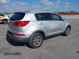 2015 Kia Sportage LX with VIN KNDPB3ACXF7791978, listed as a IAAI auction lot 42131383 with 140,533 mi miles and . Bid and sale history available at carsss.com. Image 4.