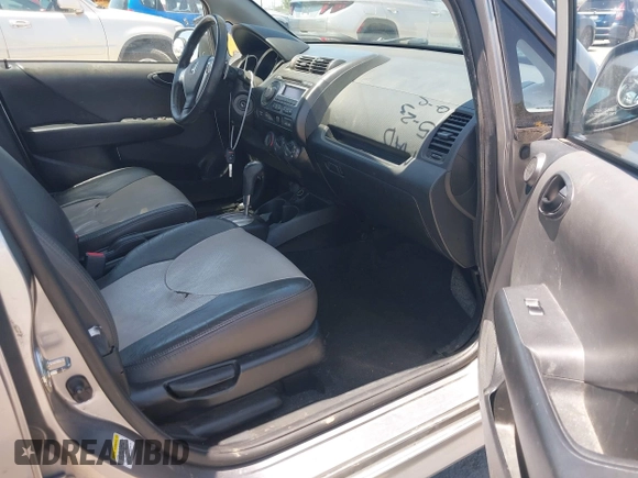 2007 Honda Fit Sport with VIN JHMGD38637S067718, listed as a IAAI auction lot 42348751 with 135,198 mi miles and . Bid and sale history available at DreamBid. Image 5.