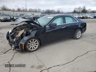 2014 Cadillac CTS Luxury AWD z VIN 1G6AX5S35E0184477, wystawiony jako Copart lot #51186245 z przebiegiem Nie podano mil oraz Szkoda całkowita • Salvage title. Historia ofert i sprzedaży dostępna na DreamBid. Obrazek 1.