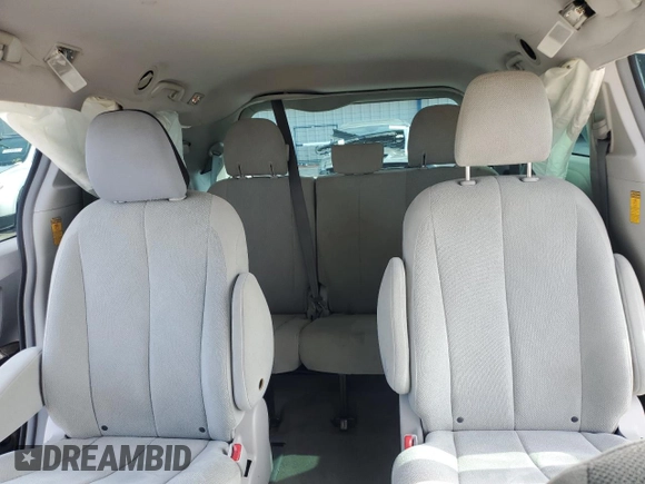 2014 Toyota Sienna L with VIN 5TDZK3DC8ES504985, listed as a Copart auction lot 56174035 with 185,955 mi miles and Salvage title. Bid and sale history available at DreamBid. Image 10.