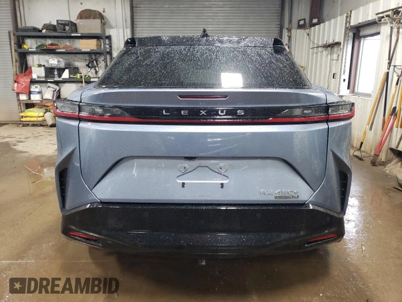 2023 Lexus RZ 450e Premium z VIN JTJAAAAB1PA004373, wystawiony jako Copart lot #48545194 z przebiegiem 21 710 mil mil oraz Szkoda całkowita • Salvage title. Historia ofert i sprzedaży dostępna na DreamBid. Obrazek 6.